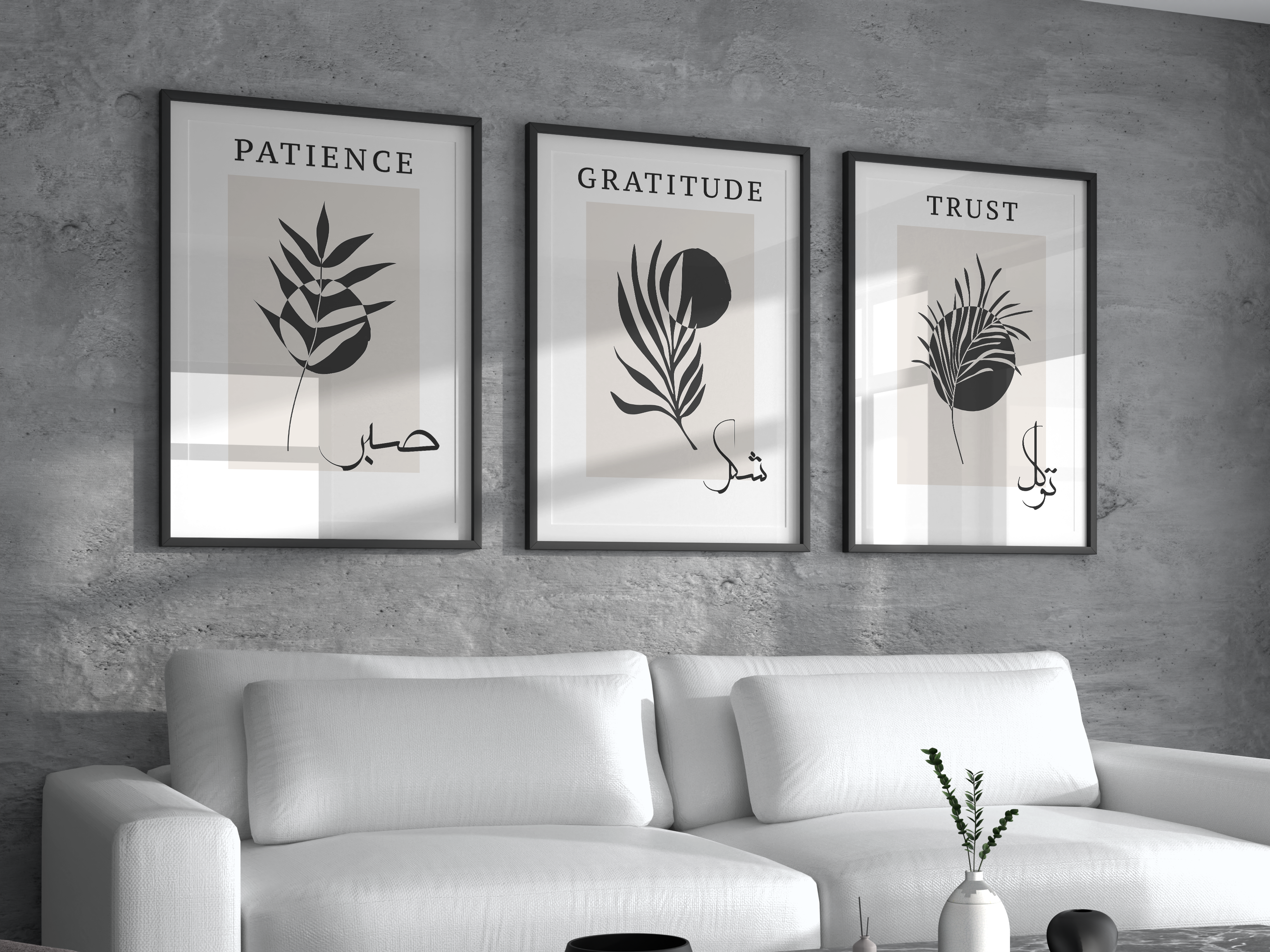 Living room with a white sofa, coffee table, and wall art featuring motivational phrases.